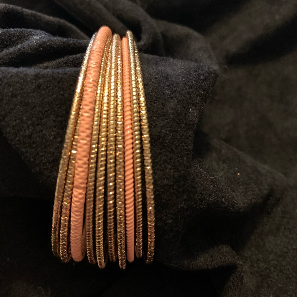 10 gold tone & coral bangle bracelets